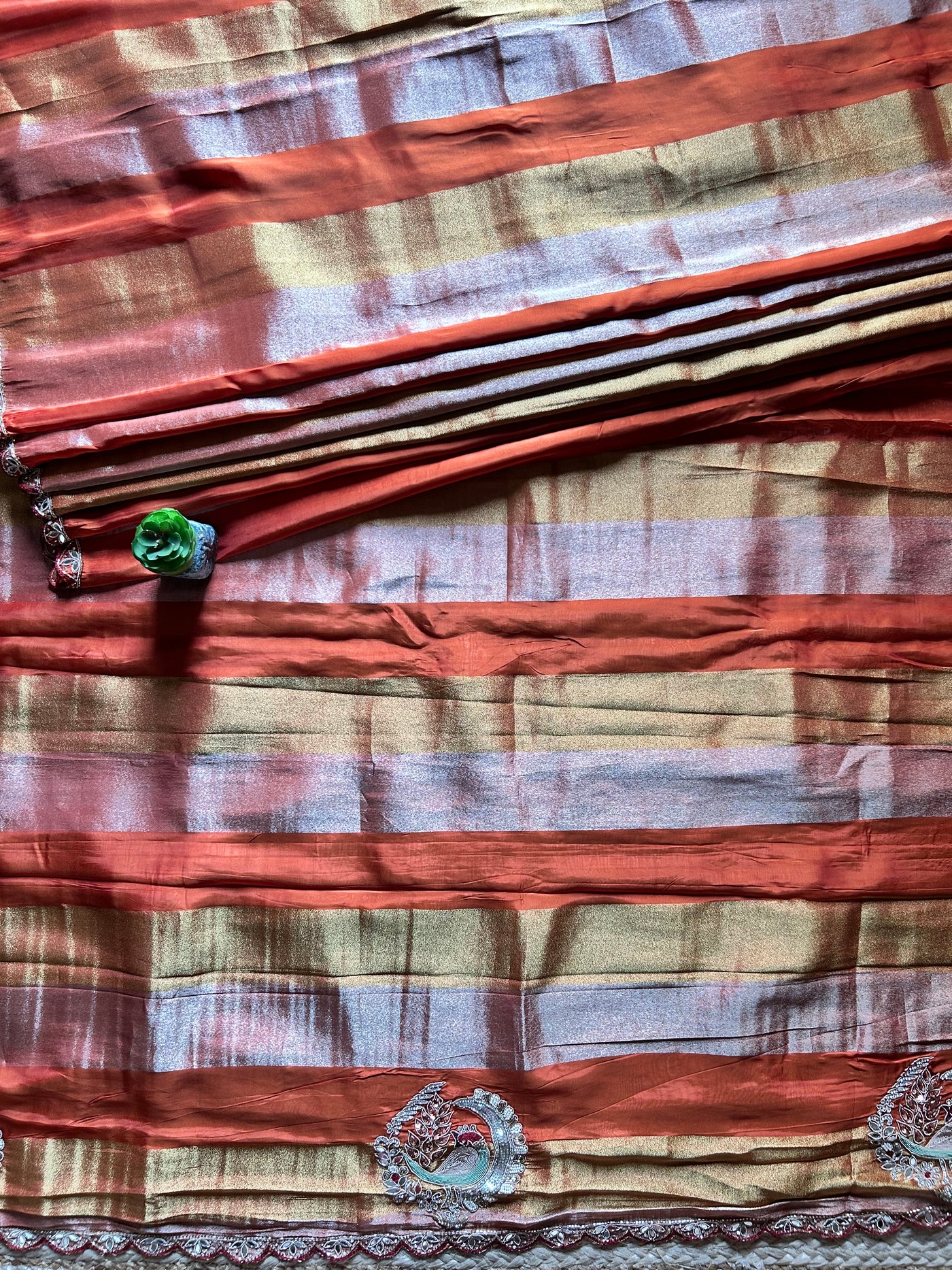 NAYANTARA: PARTYWEAR TISSUE ORGANZA SAREE WITH HAND EMBROIDERY.