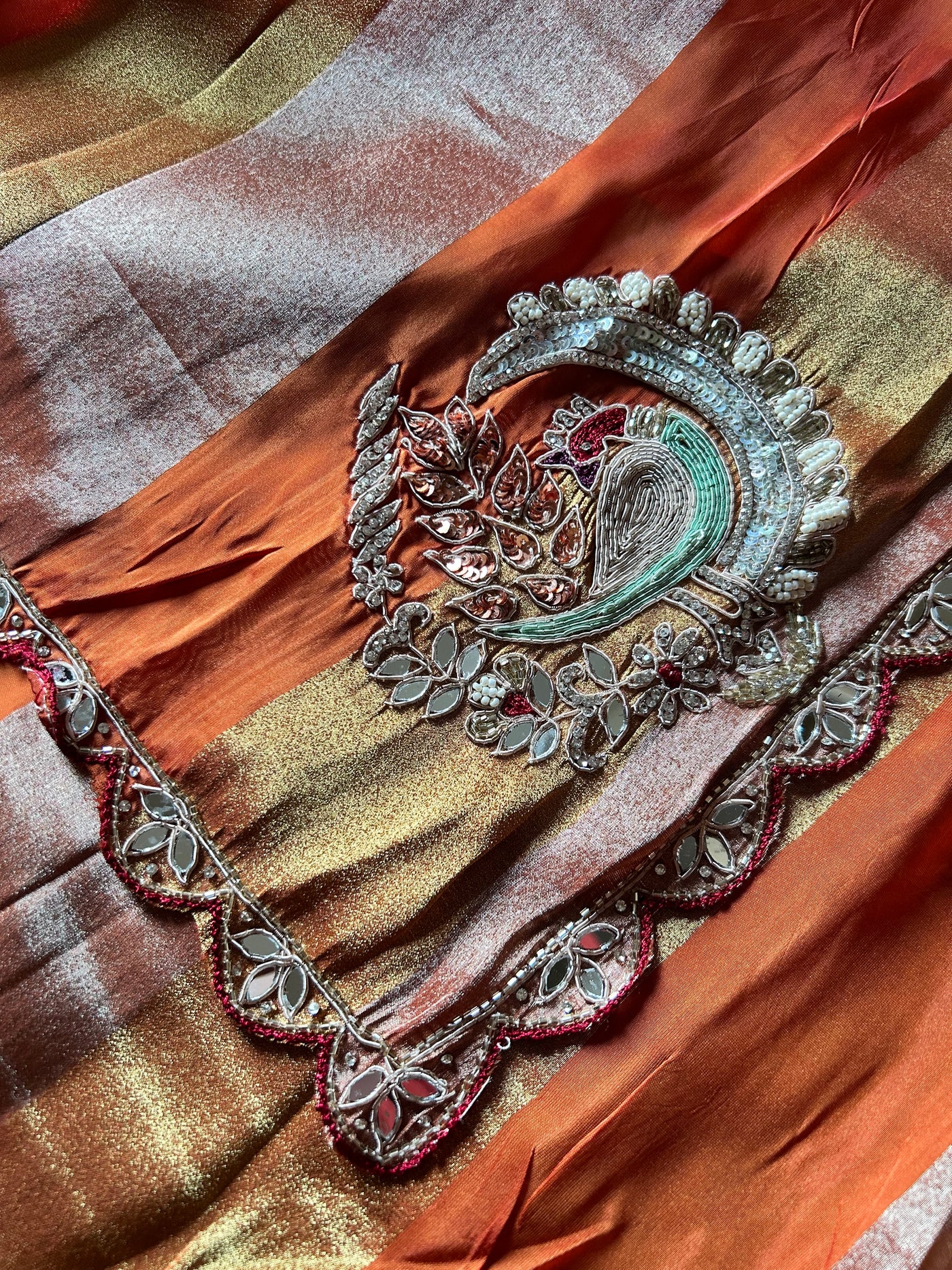 NAYANTARA: PARTYWEAR TISSUE ORGANZA SAREE WITH HAND EMBROIDERY.