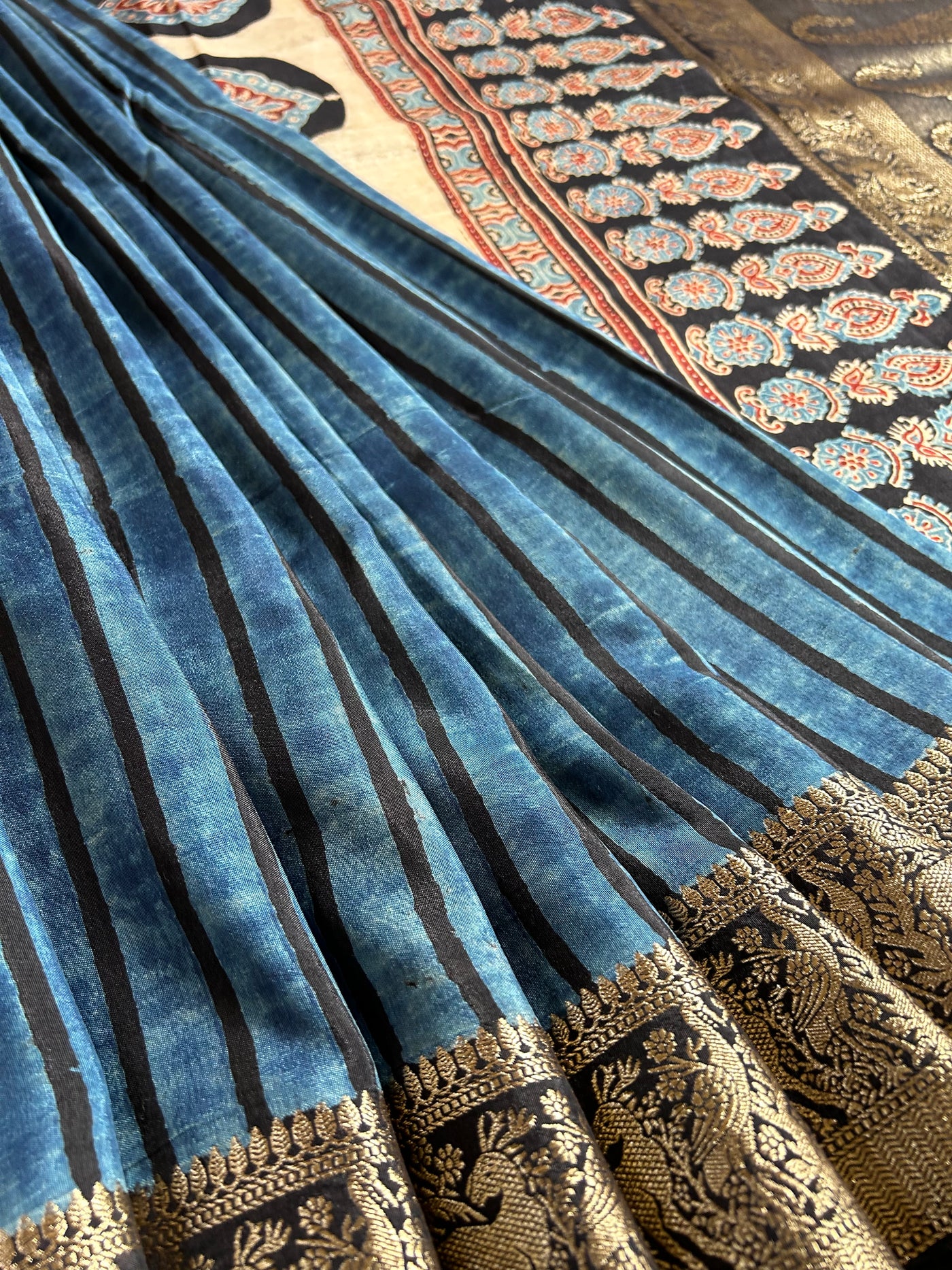 LEKHA: DENIM BLUE,HANDBLOCK AJRAKH DOLA SILK SAREE WITH MEENAKARI PALLU.