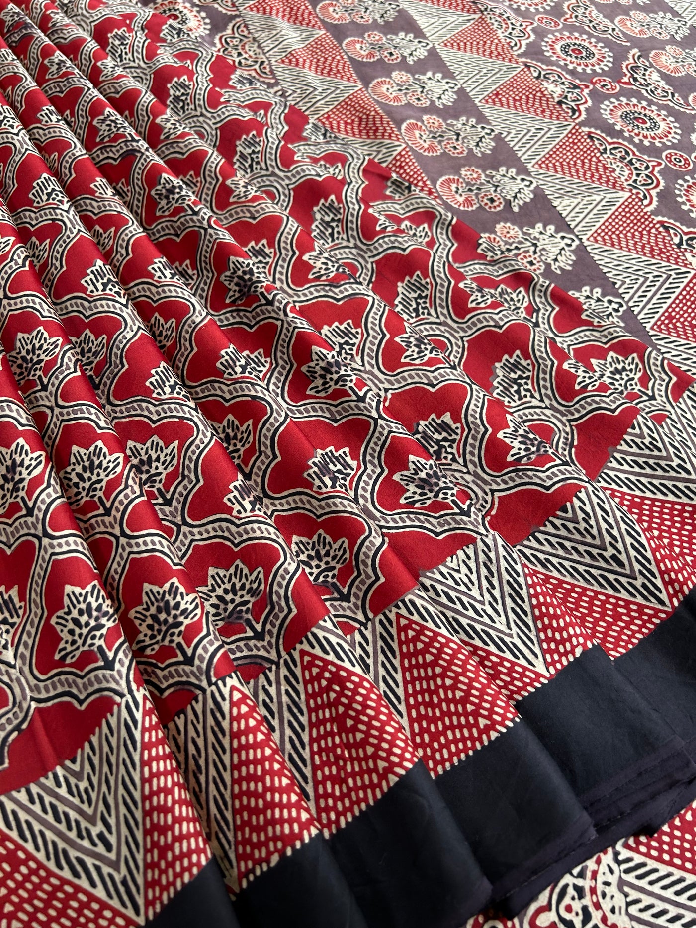 Roshni: HANDBLOCK PRINTED AJRAKH MODAL SILK SAREE