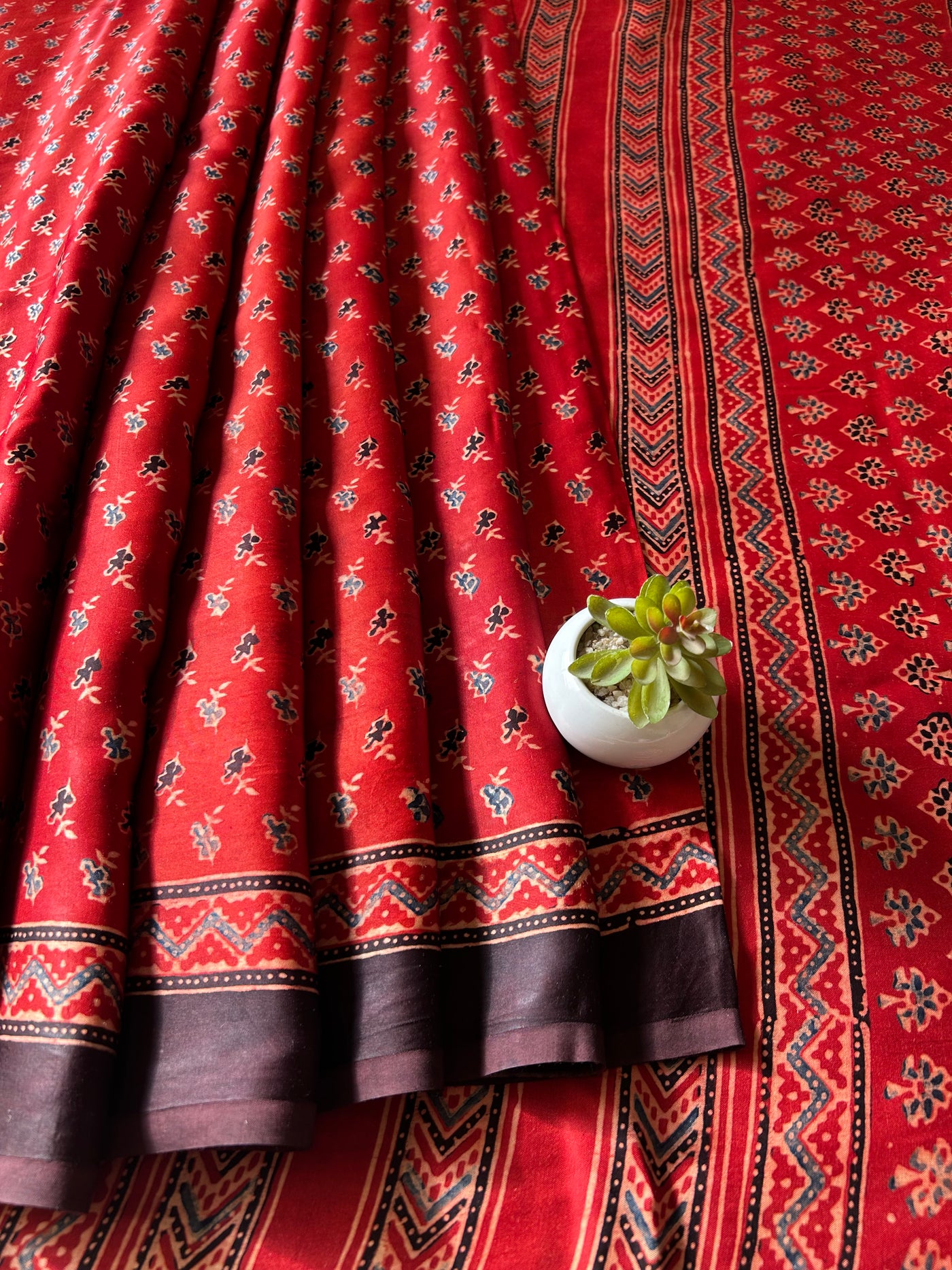 MEETHI:MADDER,HANDBLOCK PRINTED AJRAKH MODAL SILK SAREE