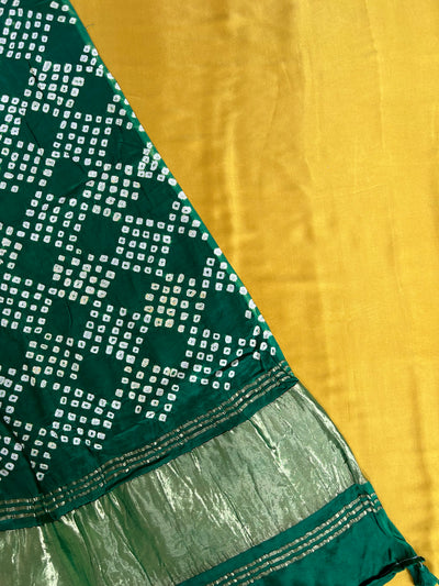 PARTHAVI : HANDMADE BANDHANI TISSUE DUPATTA WITH SOLID DYED MODAL SILK SUIT SET