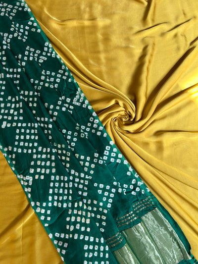 PARTHAVI : HANDMADE BANDHANI TISSUE DUPATTA WITH SOLID DYED MODAL SILK SUIT SET