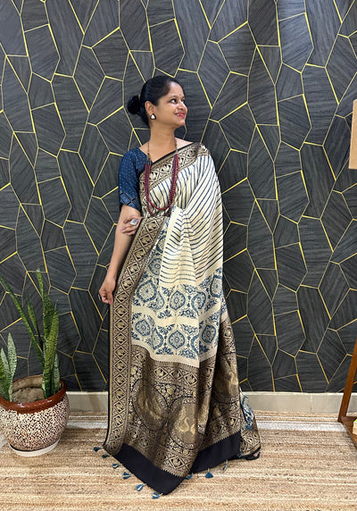 Rambha:Cream,Handblock printed ajrakh premium dola silk saree with meenakari pallu