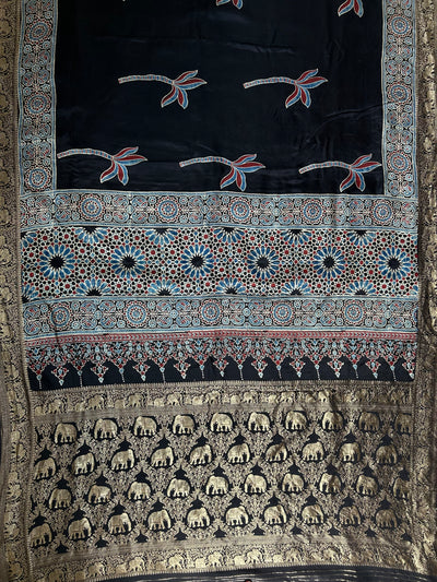 Laxmi:BLACK,HANDBLOCK AJRAKH DOLA SILK SAREE WITH MEENAKARI PALLU.
