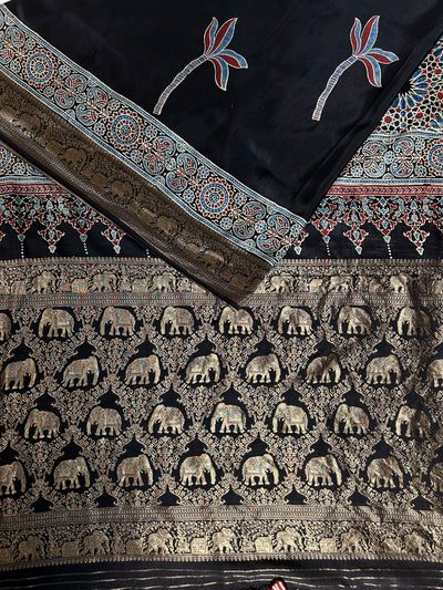 Laxmi:BLACK,HANDBLOCK AJRAKH DOLA SILK SAREE WITH MEENAKARI PALLU.