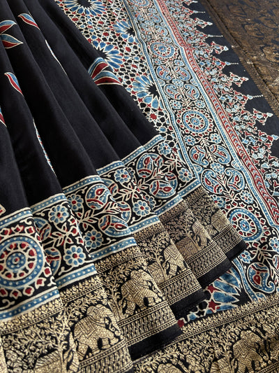 Laxmi:BLACK,HANDBLOCK AJRAKH DOLA SILK SAREE WITH MEENAKARI PALLU.