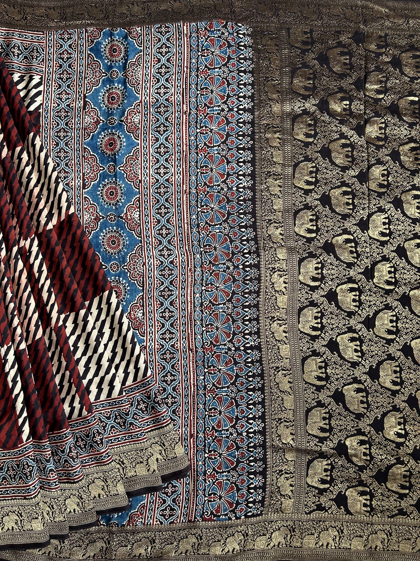 Kinjal:Handblock Ajrakh Dola Silk Saree With Meenakari Pallu.