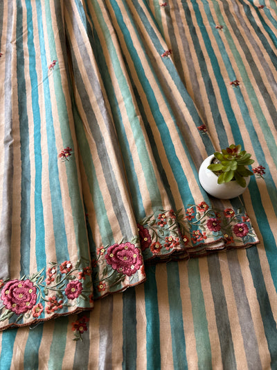 LAILA:DESIGNER MUSLIN SILK PRINTED SAREE WITH EMBROIDERY WORK.