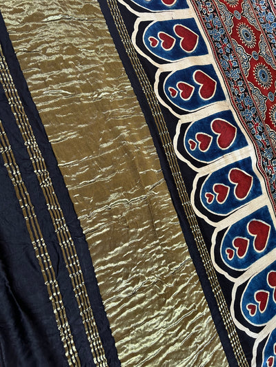 TANUJA: HANDMADE AJRAKH BANDHEJ MODAL SILK SAREE