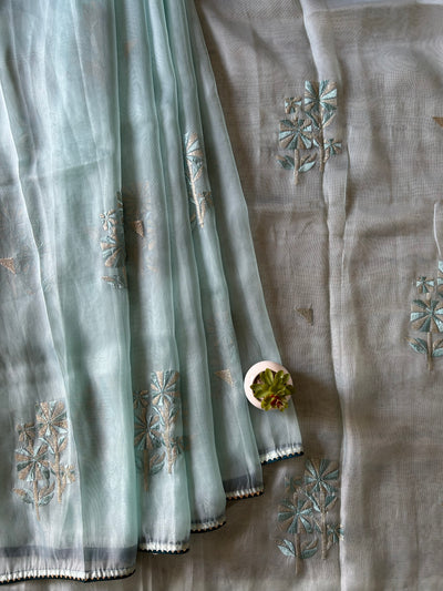 KANGNA: PASTEL BLUE, TISSUE ORGANZA PARTY WEAR SAREE WITH ALL OVER EMBROIDERY.
