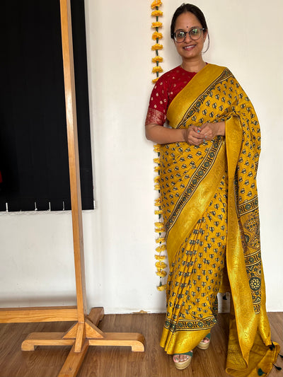 Aarzu: HANDBLOCK AJRAKH DOLA SILK SAREE WITH MEENAKARI PALLU.