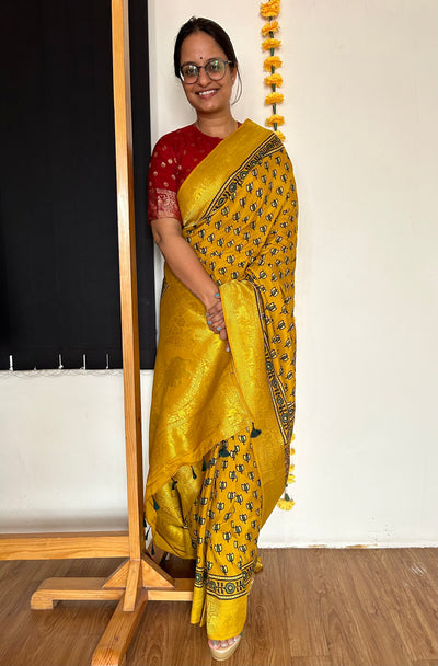 Aarzu: HANDBLOCK AJRAKH DOLA SILK SAREE WITH MEENAKARI PALLU.
