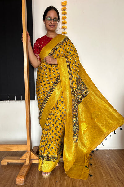 Aarzu: HANDBLOCK AJRAKH DOLA SILK SAREE WITH MEENAKARI PALLU.