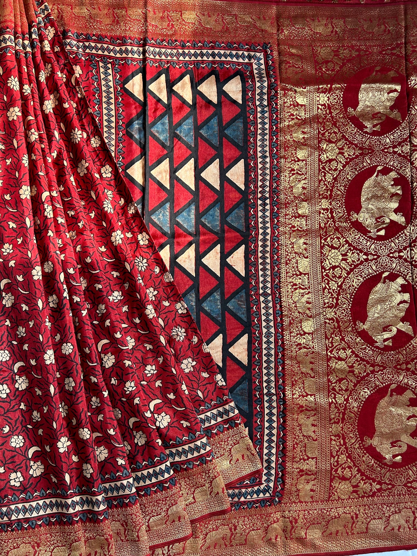 KHUSHI:MADDER,HANDBLOCK AJRAKH DOLA SILK SAREE WITH MEENAKARI PALLU.