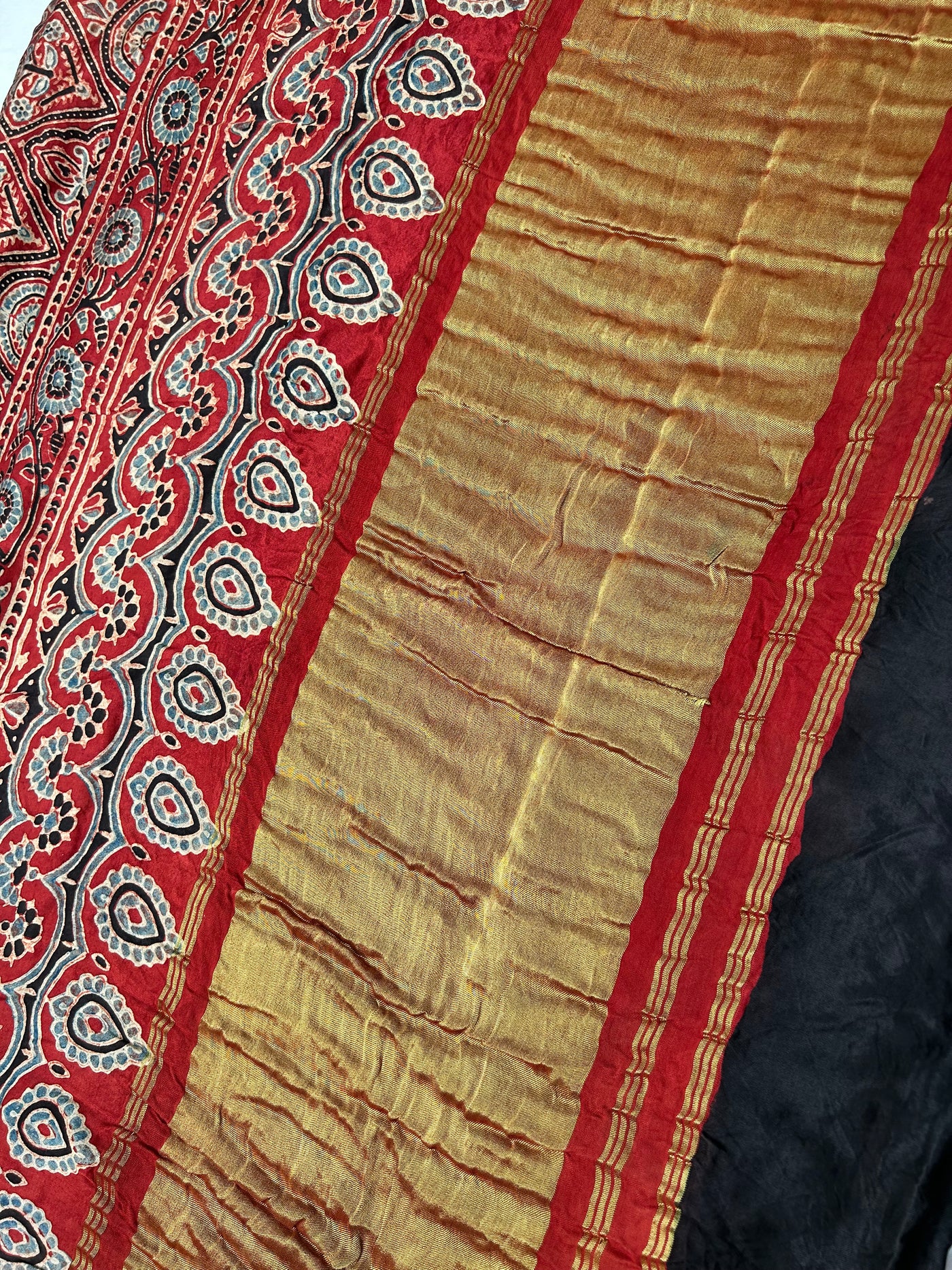 Sindhuja: AJRAKH BANDHEJ TISSUE MODAL SILK SAREE