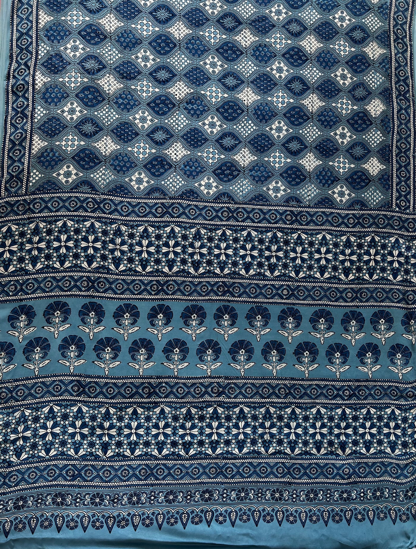 APARAJITA: HAND BLOCK AJRAKH MODAL SILK SAREE