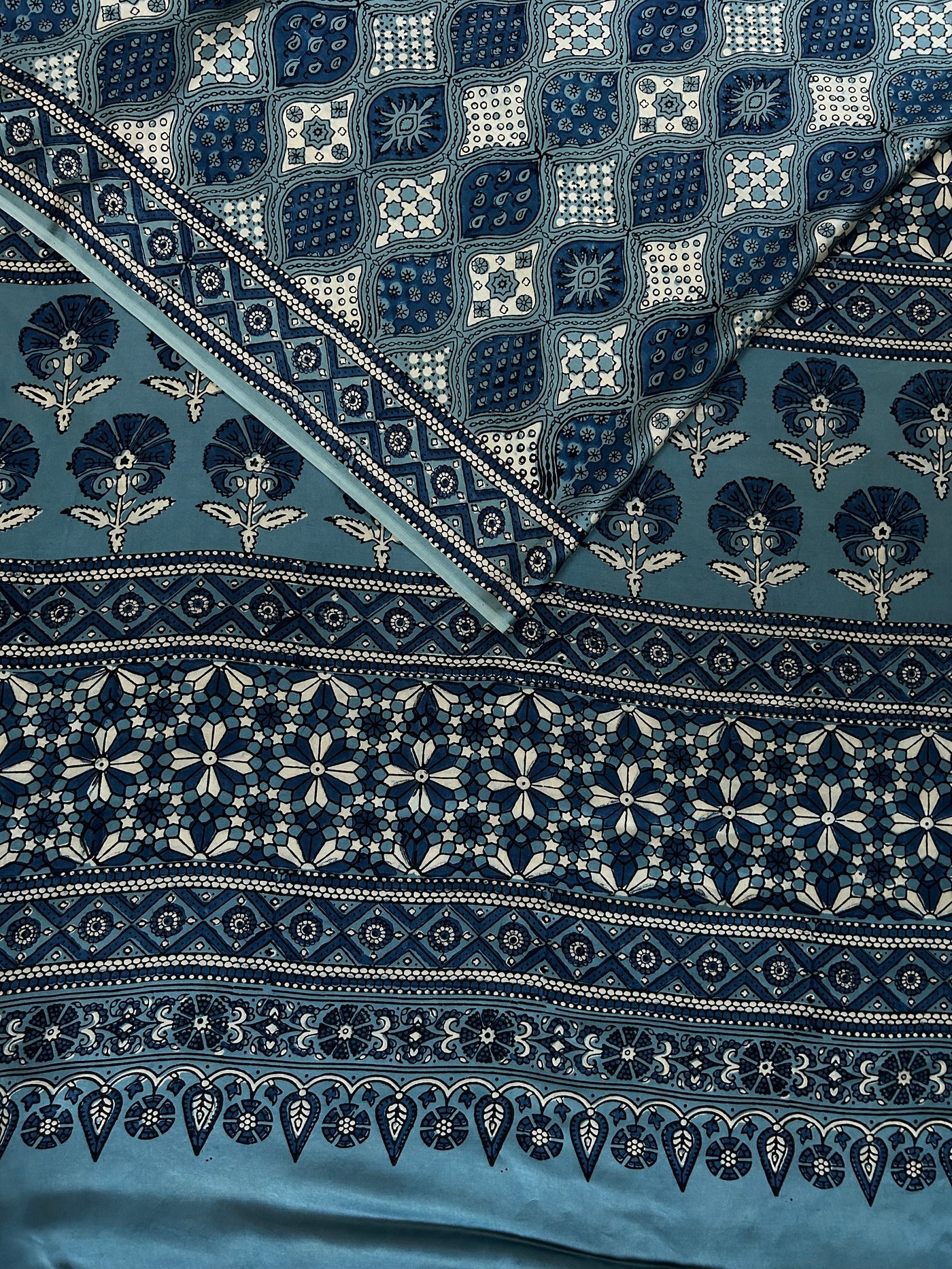 APARAJITA: HAND BLOCK AJRAKH MODAL SILK SAREE