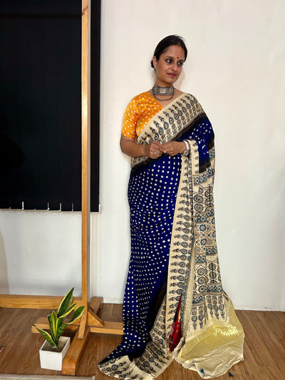 AAKRUTI : HANDMADE BANDHANI AJRAKH MODAL SILK SAREE WITH TISSUE PALLU