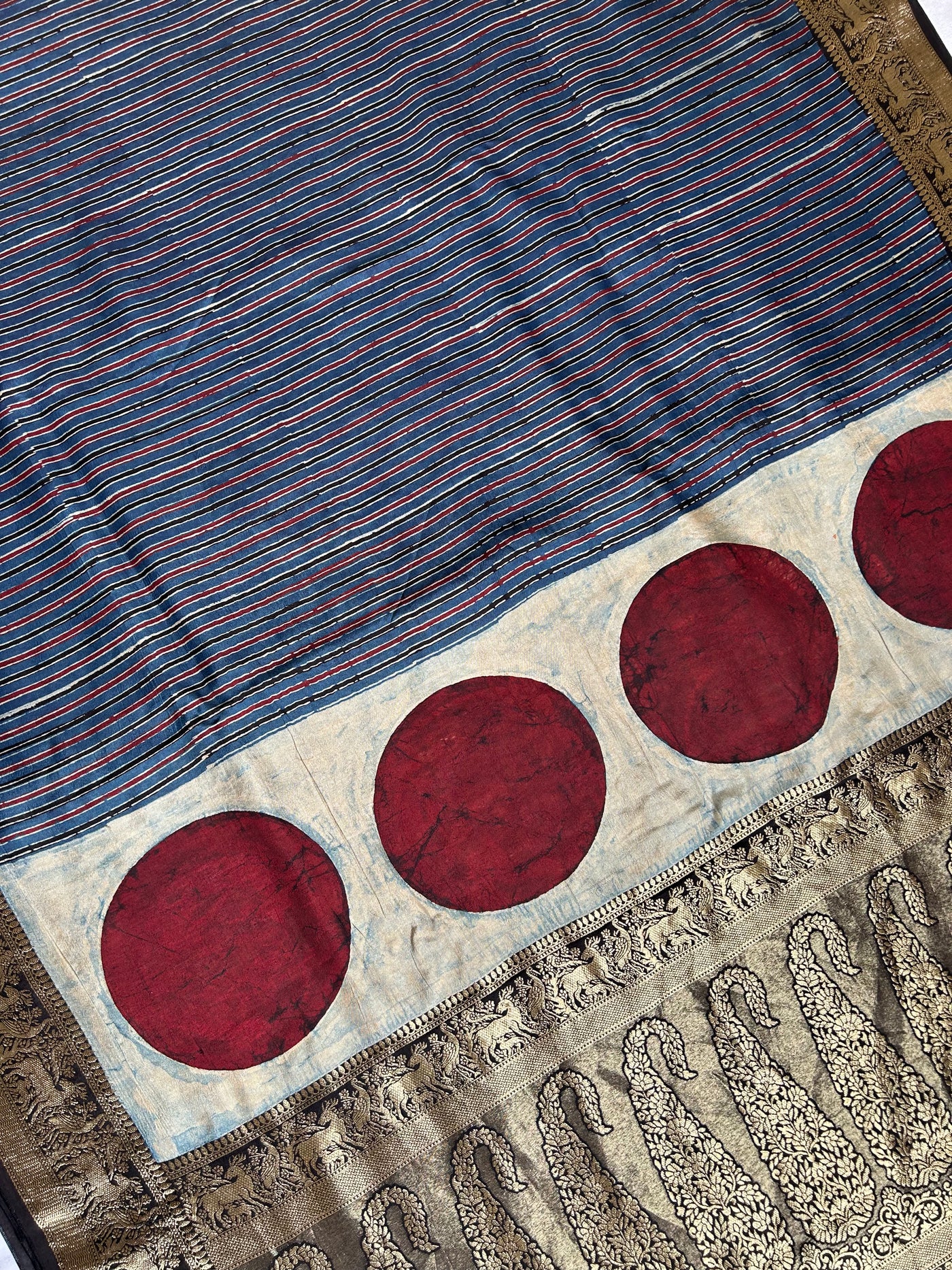 HEMA :INDIGO,HANDBLOCK AJRAKH DOLA SILK SAREE WITH MEENAKARI PALLU.