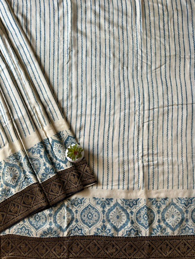 Rambha:Cream,Handblock printed ajrakh premium dola silk saree with meenakari pallu