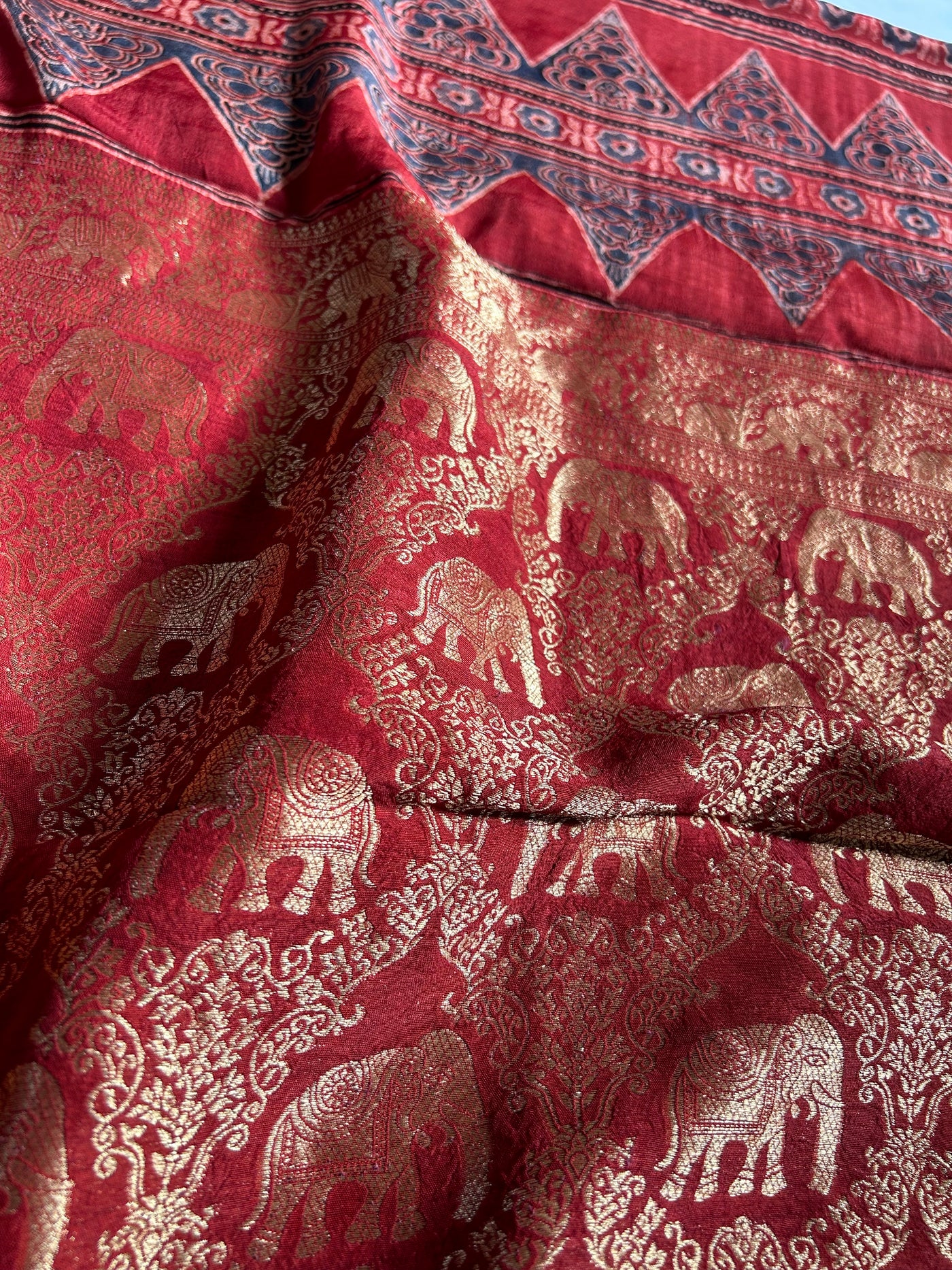 PRISHA:MADDER,HANDBLOCK AJRAKH DOLA SILK SAREE WITH MEENAKARI PALLU.