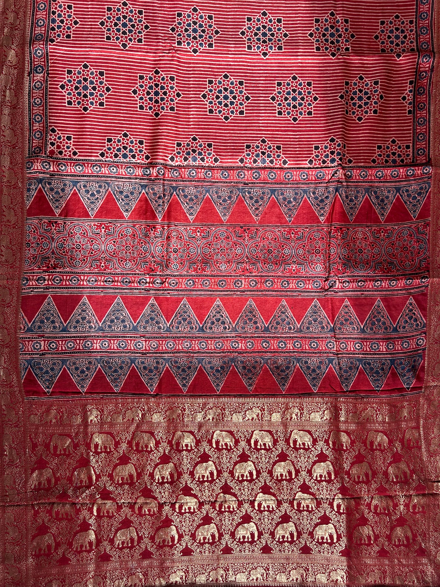 PRISHA:MADDER,HANDBLOCK AJRAKH DOLA SILK SAREE WITH MEENAKARI PALLU.